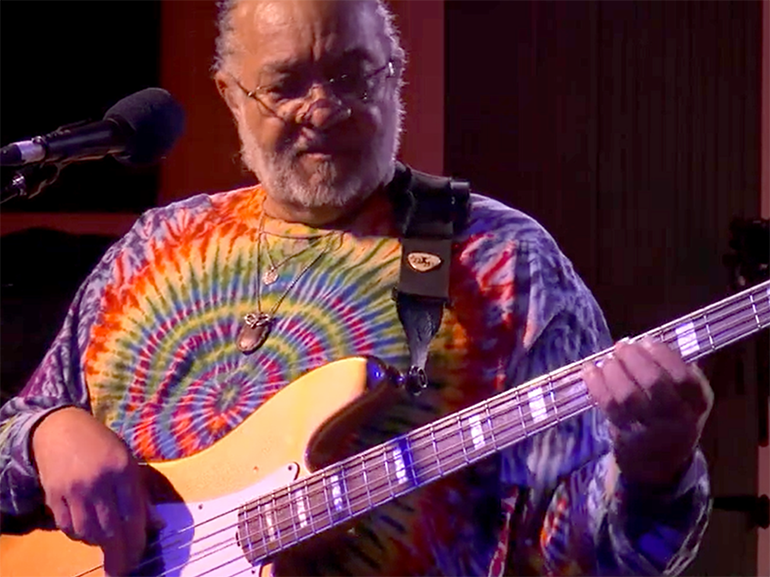 Image of a man playing electric bass
