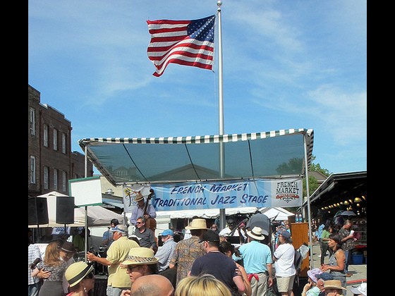 Dancers in front of the Traditional Jazz stage at French Quarter Fest.